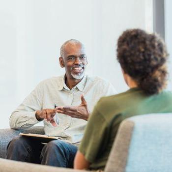 A financial specialist meets with a Patelco member.